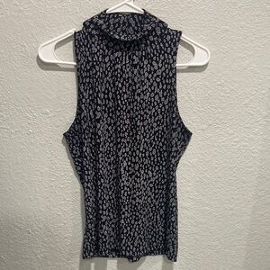 Elegant Black and White Patterned Sleeveless Blouse